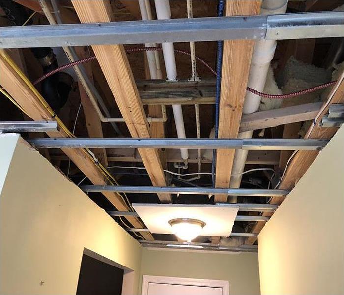 water damage due to a leaking pipe above the ceiling