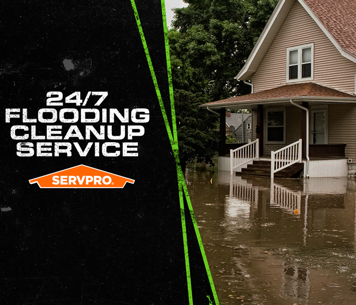 House surrounded by flood standing water with the caption: 24/7 FLOODING CLEANUP SERVICE.