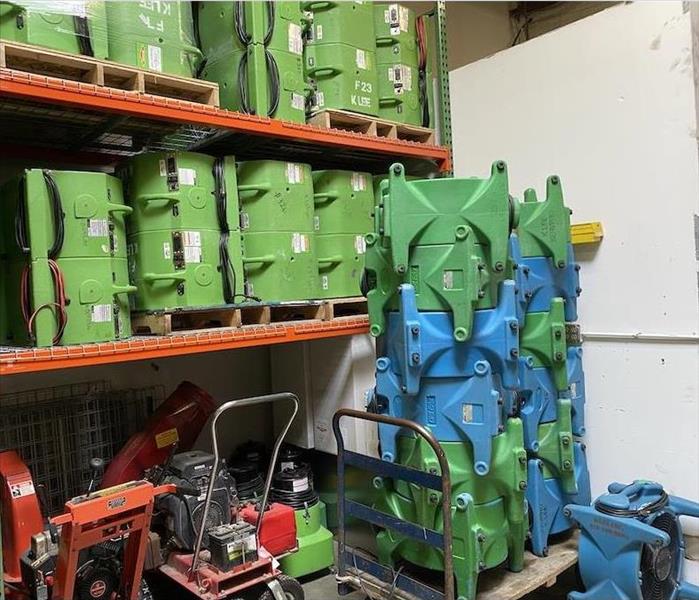 corner of warehouse loaded with SERVPRO equipment 